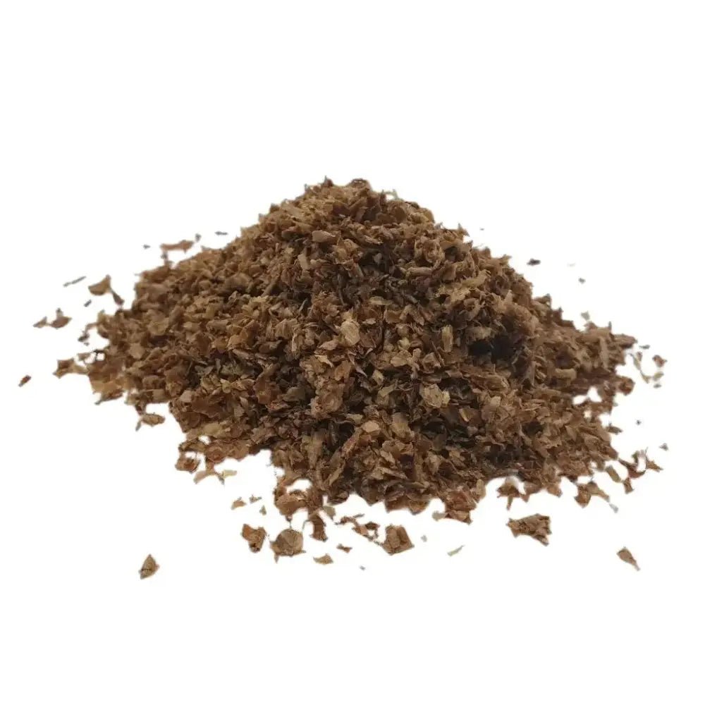 Organic Bokashi Bran — close-up pile of pale-brown fermented bran flakes