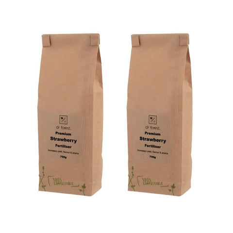Organic Strawberry Fertiliser — two 750g kraft bags labelled Dr Forest Premium Strawberry Fertiliser, 100% Compostable
