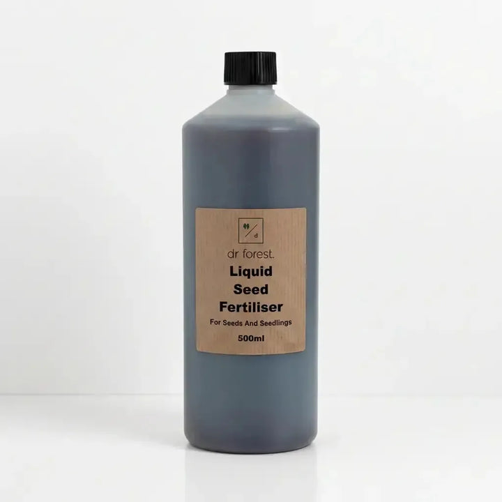 Dr Forest Liquid Seed Fertiliser 500ml dark-liquid bottle with kraft label — liquid fertiliser range