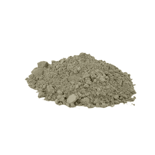 Volcanic Rock Dust — pile of fine grey-green basalt powder