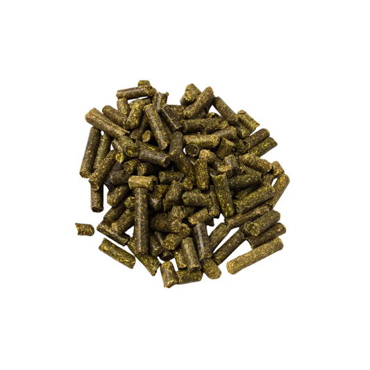 Alfalfa Meal Pellets — pile of dark green cylindrical alfalfa pellets