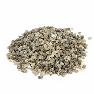 Polyhalite Fertiliser — pile of pink-grey rocky polyhalite crystals
