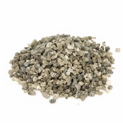 Polyhalite Fertiliser — pile of pink-grey rocky polyhalite crystals