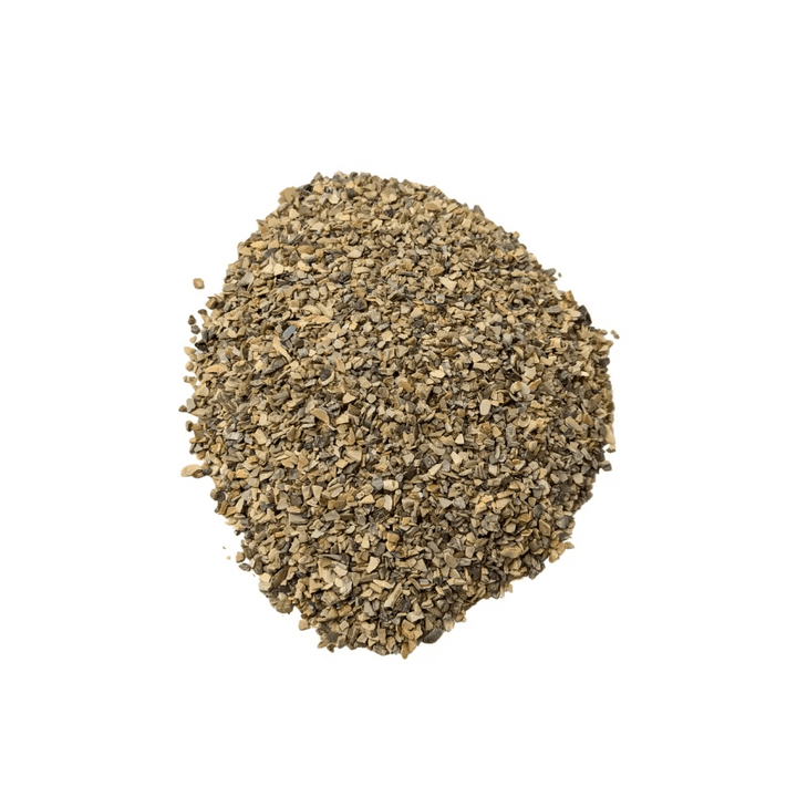 Organic Sea Shell Meal — pile of coarse cream and dark shell chips