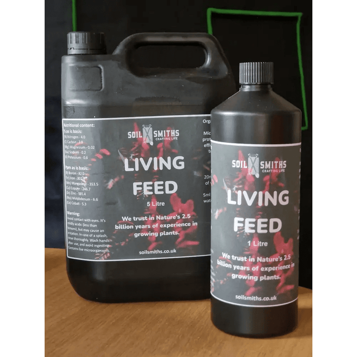 Soil Smiths Living Feed — two black bottles side by side: 5 Litre and 1 Litre, dark labels with Soil Smiths branding